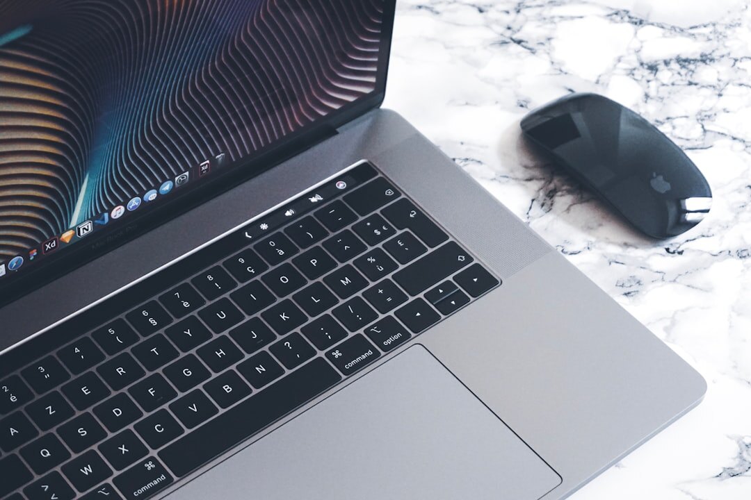 Businessman analyzing financial charts on a laptop